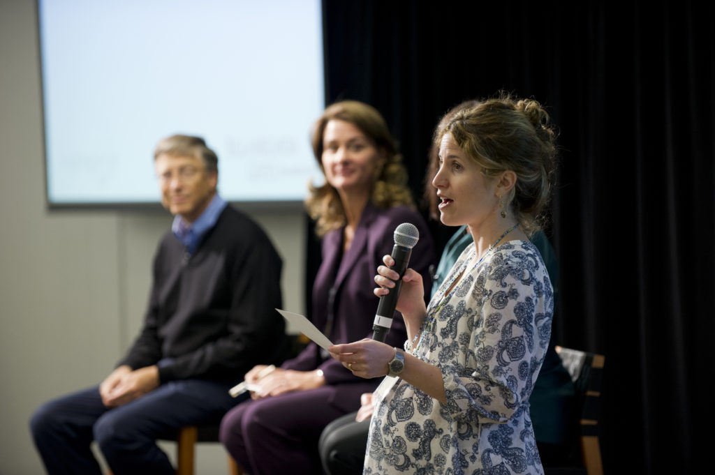 Giving Pledge founder Olivia Leland on a panel with Bill and Melinda Gates. 